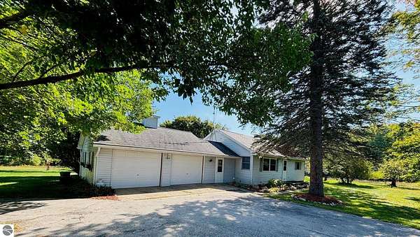 2.3 Acres of Land with Home for Sale in Central Lake, Michigan