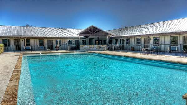 223 Acres of Recreational Land with Home for Sale in Concan, Texas