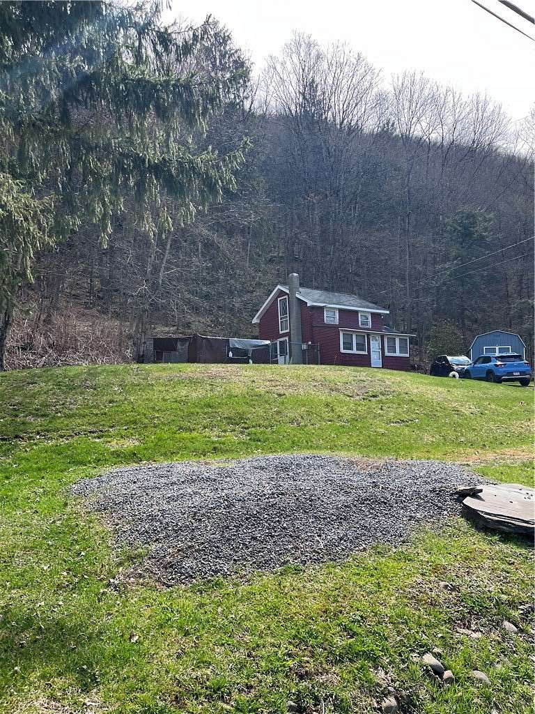 0.56 Acres of Land with Home for Sale in Margaretville, New York