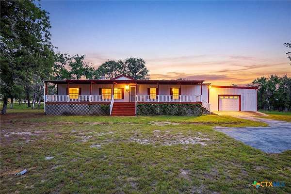 5 Acres of Land with Home for Sale in Floresville, Texas