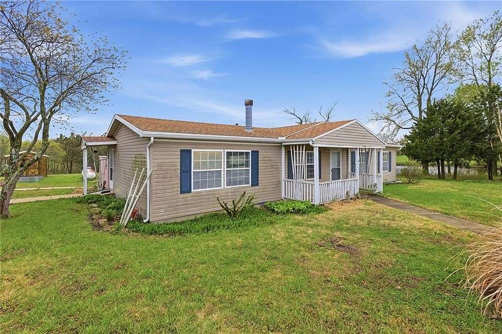 30 Acres of Recreational Land with Home for Sale in Garden City, Missouri