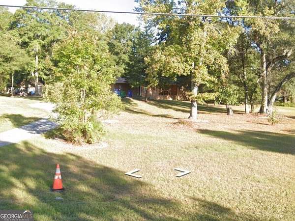 2.78 Acres of Land with Home for Sale in Lithonia, Georgia