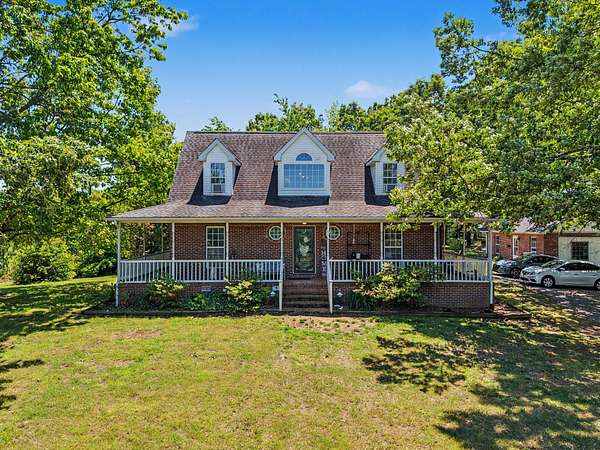 12 Acres of Land with Home for Auction in Bethpage, Tennessee