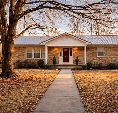 6.72 Acres of Land with Home for Sale in Dover, Tennessee