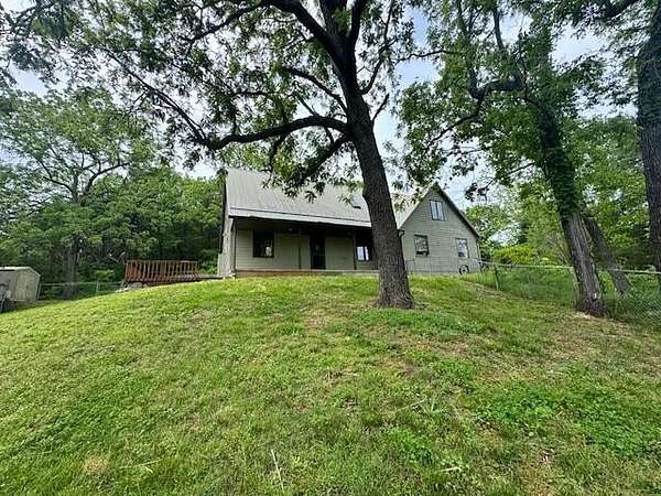 20 Acres of Recreational Land with Home for Sale in Crane, Missouri