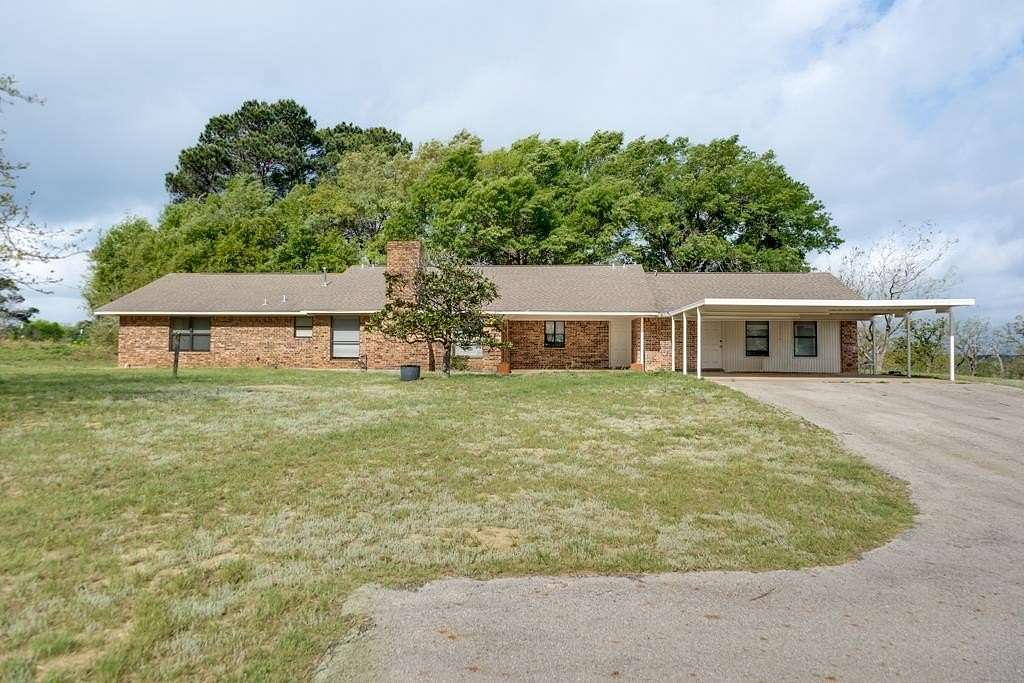 39.8 Acres of Recreational Land with Home for Sale in Elkhart, Texas