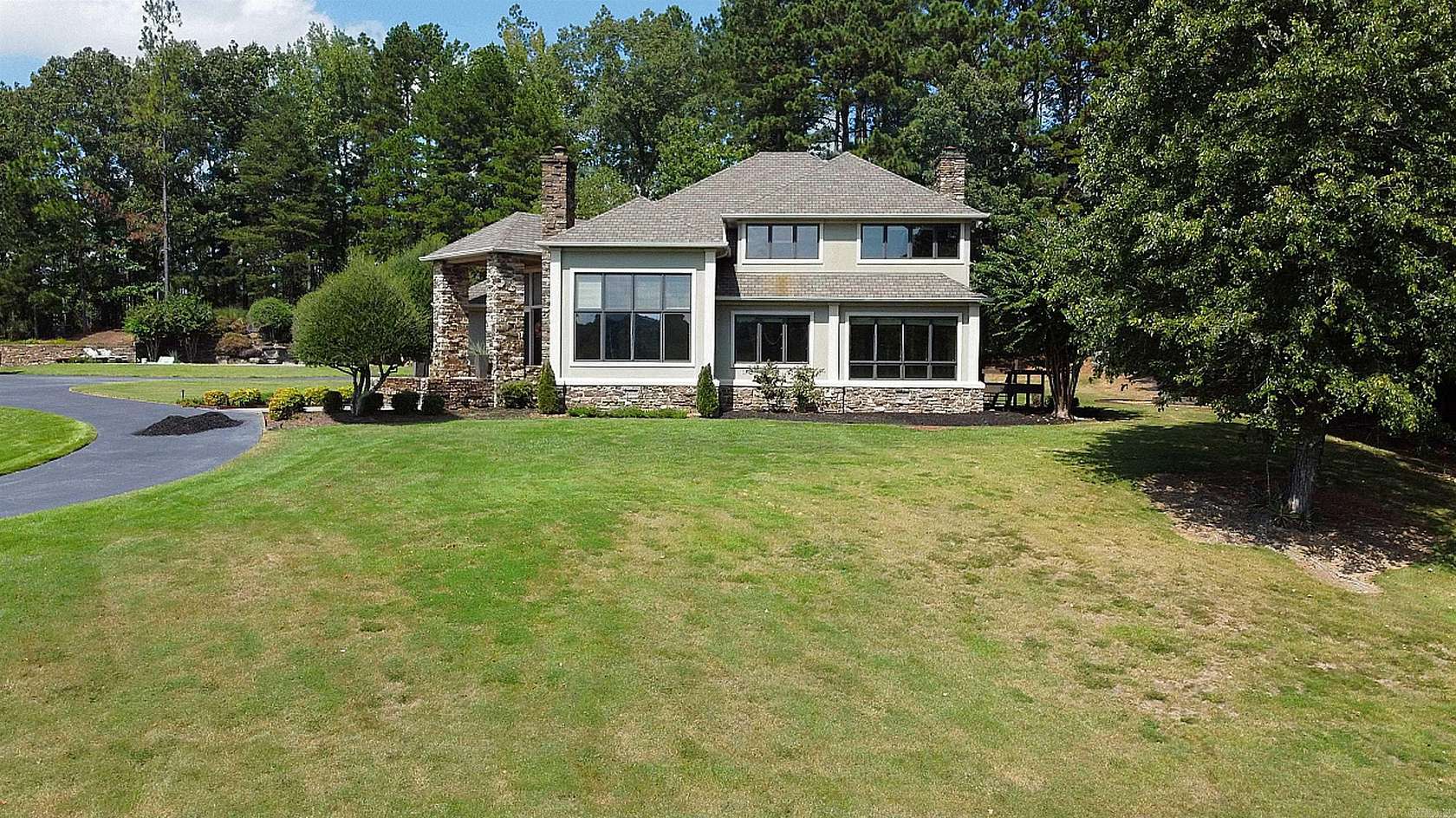 1.58 Acres of Land with Home for Sale in Benton, Arkansas