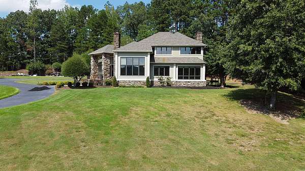 1.58 Acres of Land with Home for Sale in Benton, Arkansas