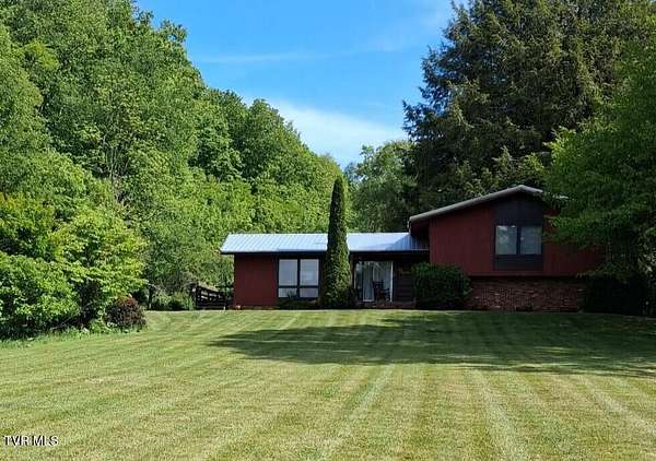 51 Acres of Land with Home for Sale in Roan Mountain, Tennessee