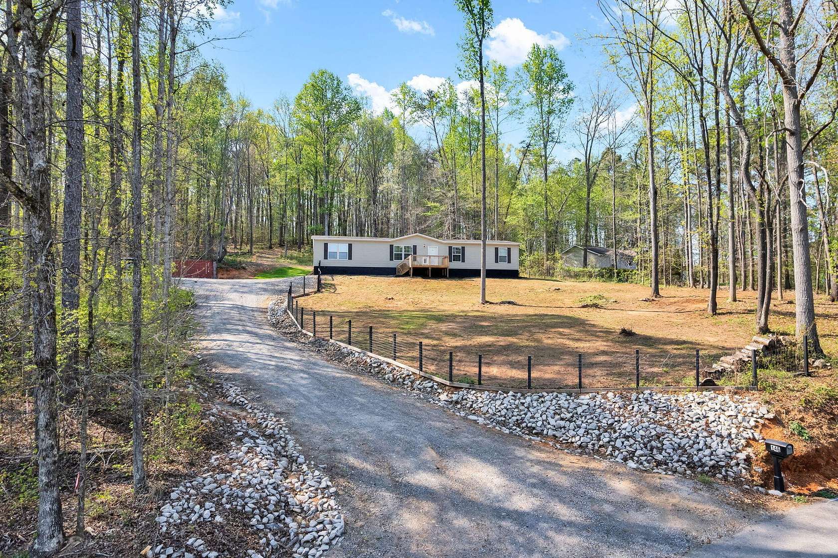 5 Acres of Land with Home for Sale in Riceville, Tennessee