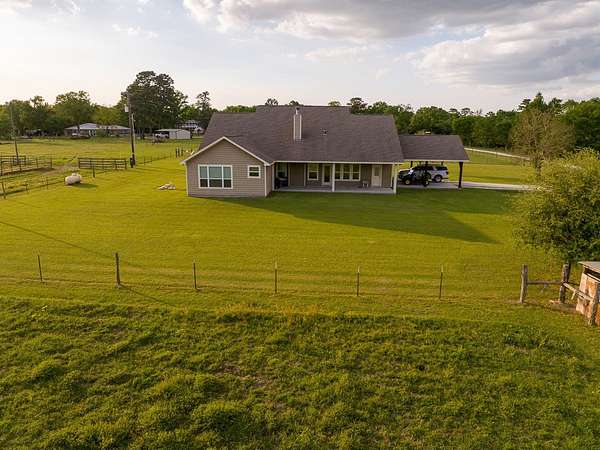 28.7 Acres of Agricultural Land with Home for Sale in Huntsville, Texas