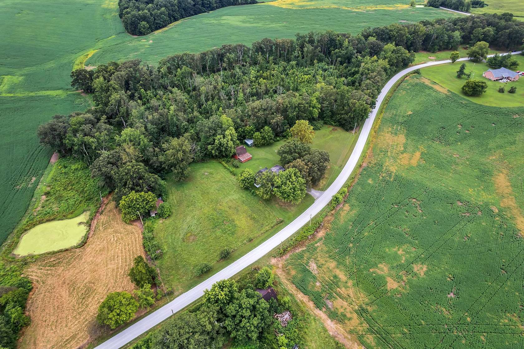 10.5 Acres of Land with Home for Sale in Manchester, Tennessee