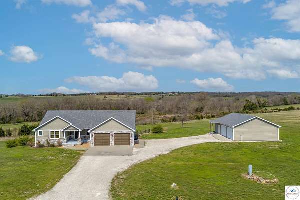 11.4 Acres of Land with Home for Sale in Warsaw, Missouri