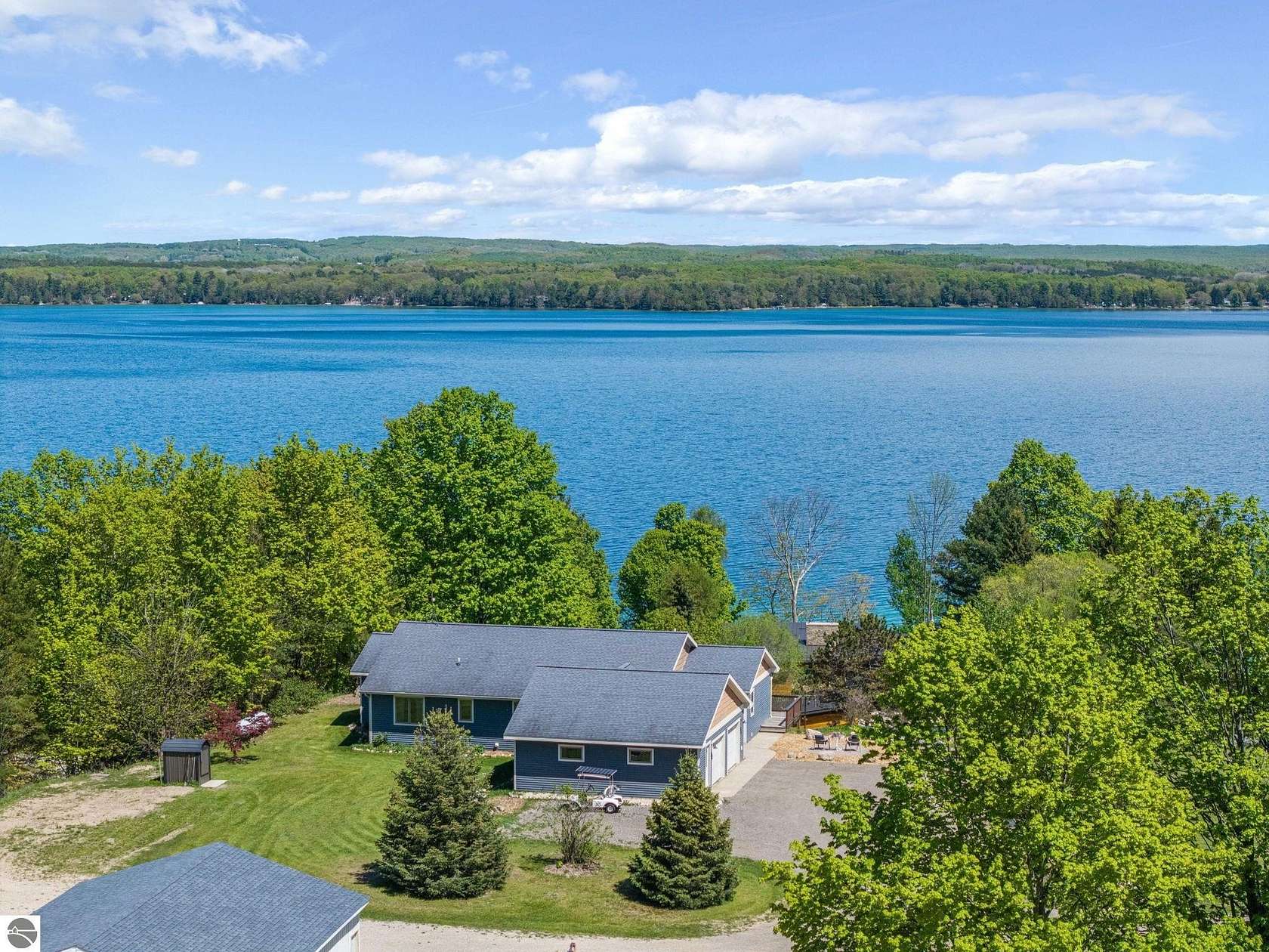 3.5 Acres of Land with Home for Sale in Kewadin, Michigan