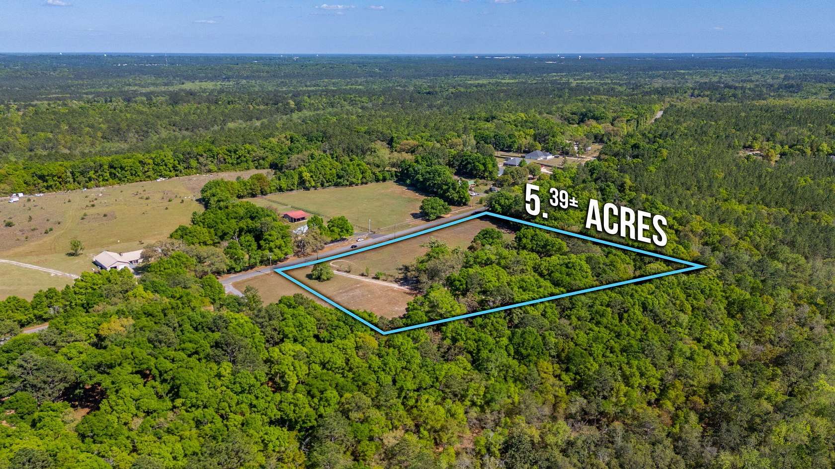 5.39 Acres of Land with Home for Sale in Baker, Florida