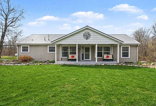 19.9 Acres of Recreational Land with Home for Sale in Coloma, Michigan