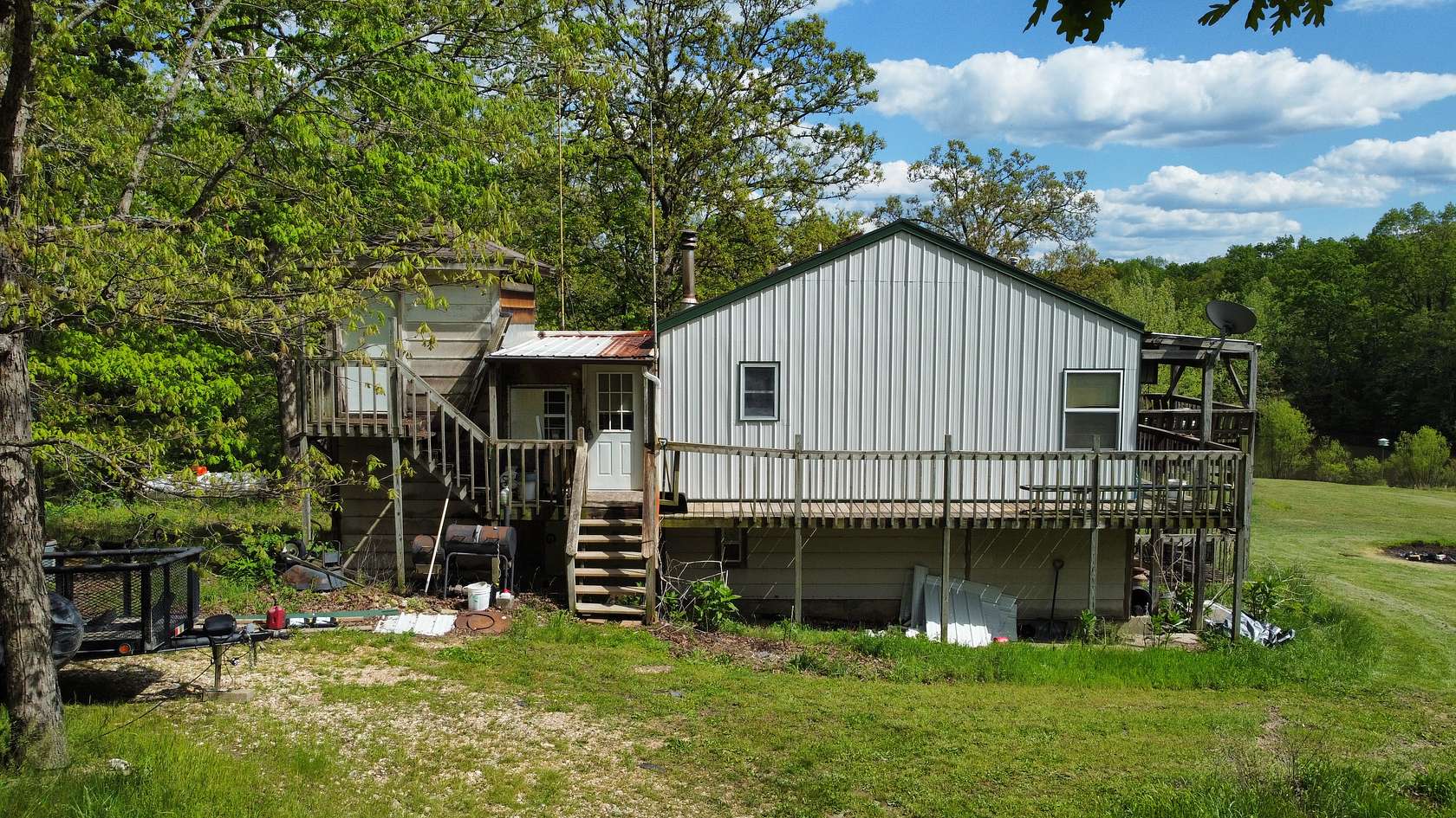 29.2 Acres of Land with Home for Sale in Versailles, Missouri