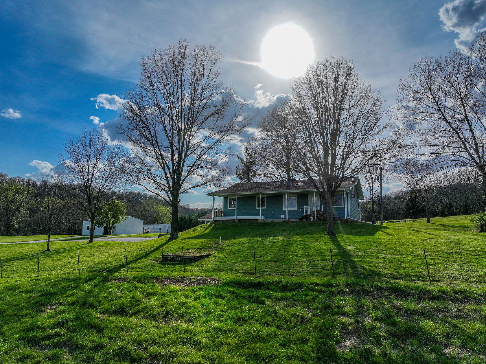 80.9 Acres of Recreational Land with Home for Sale in Collins, Missouri