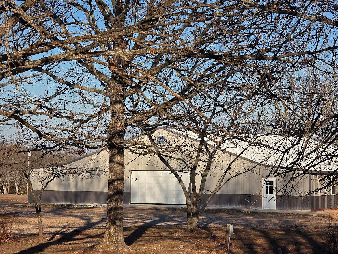 34 Acres of Recreational Land with Home for Sale in Stoutland, Missouri