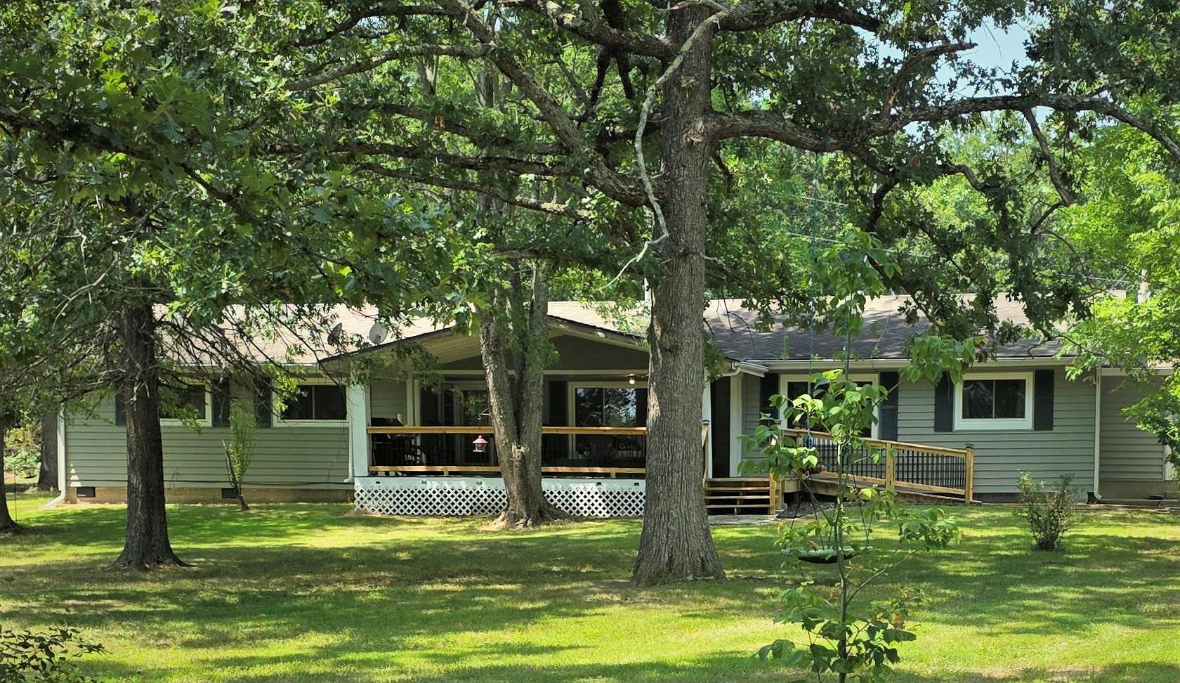 7 Acres of Land with Home for Sale in Stoutland, Missouri