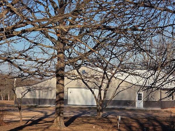 34 Acres of Recreational Land with Home for Sale in Stoutland, Missouri