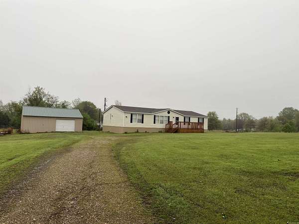 2.12 Acres of Land with Home for Sale in Greenbrier, Arkansas