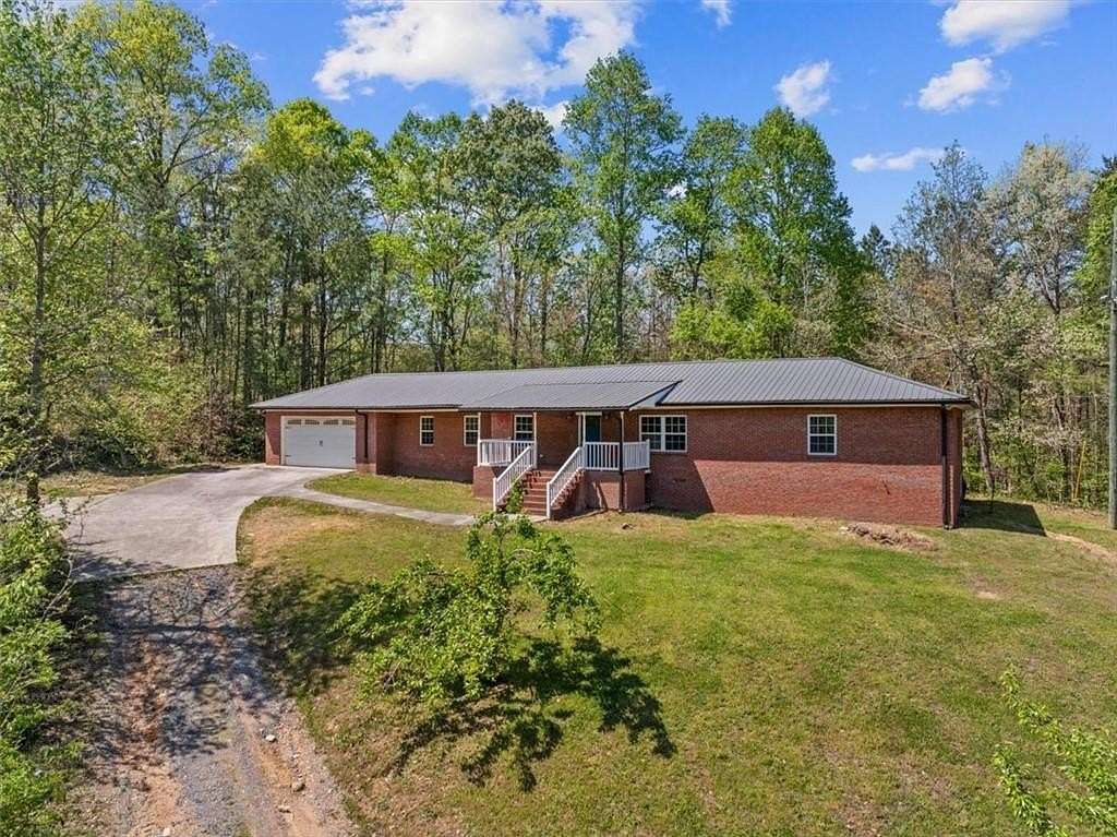 7.9 Acres of Land with Home for Sale in Plainville, Georgia