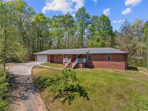 7.9 Acres of Land with Home for Sale in Plainville, Georgia