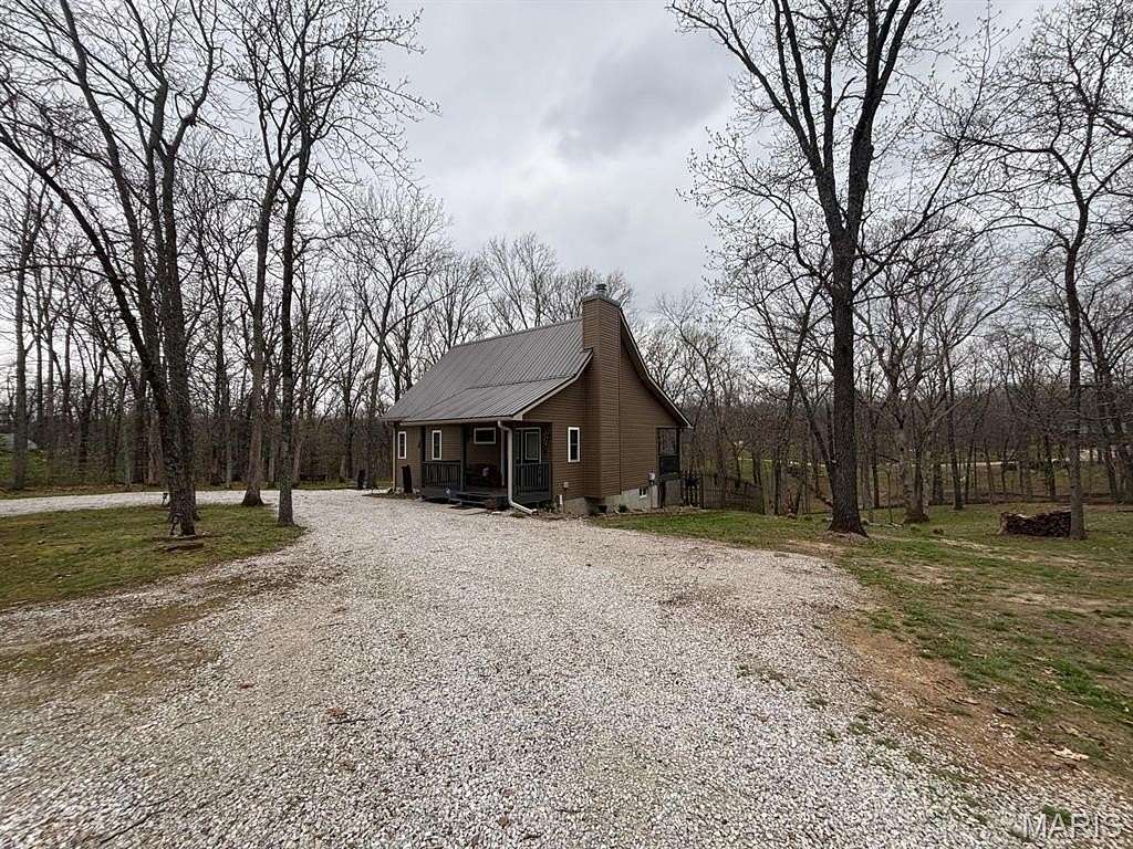 1.7 Acres of Land with Home for Sale in Stoutsville, Missouri