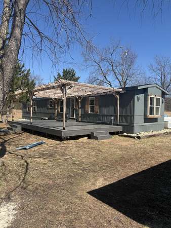 10 Acres of Land with Home for Sale in Cadillac, Michigan