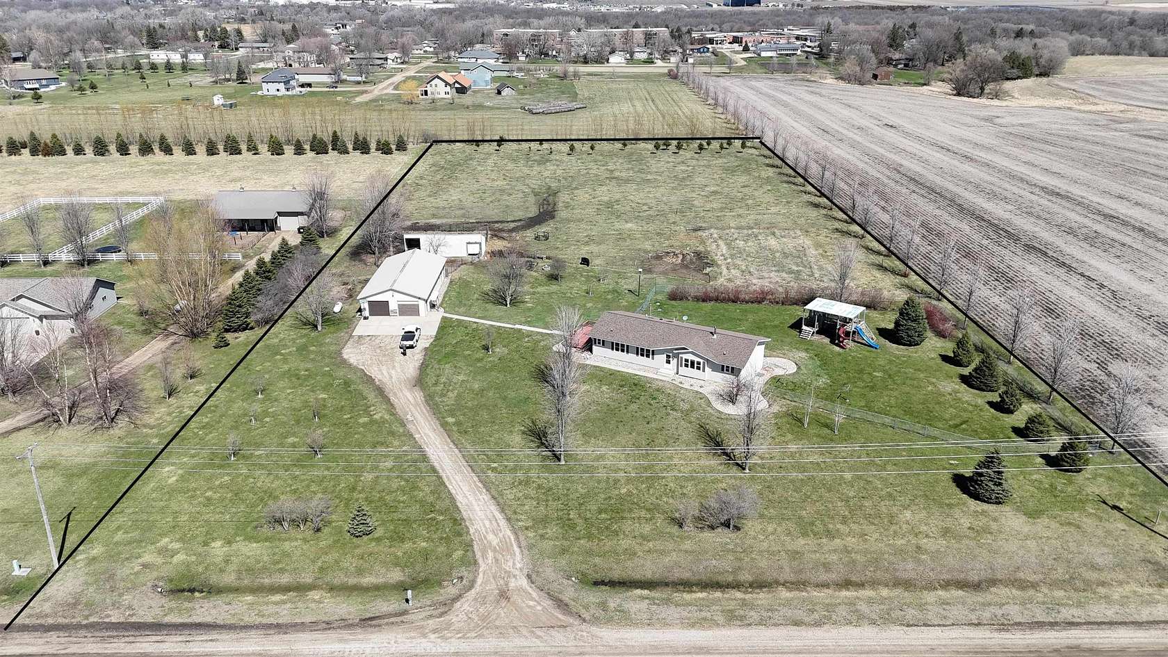 5 Acres of Land with Home for Sale in Spencer, Iowa