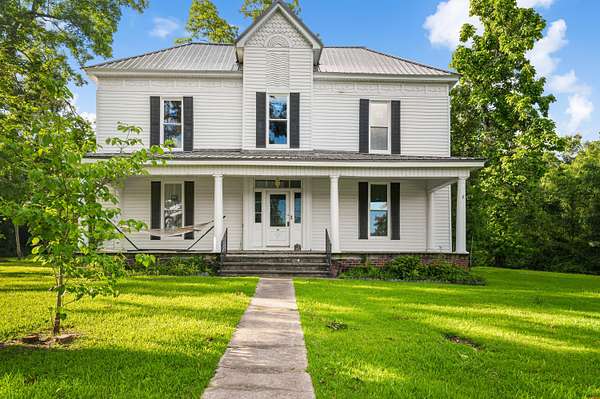 3.89 Acres of Land with Home for Sale in Blue Mountain, Mississippi