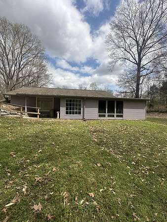 30.5 Acres of Land with Home for Sale in Puryear, Tennessee