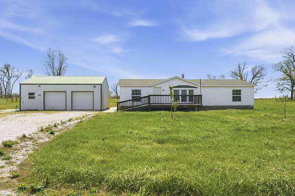 20.6 Acres of Land with Home for Sale in La Russell, Missouri