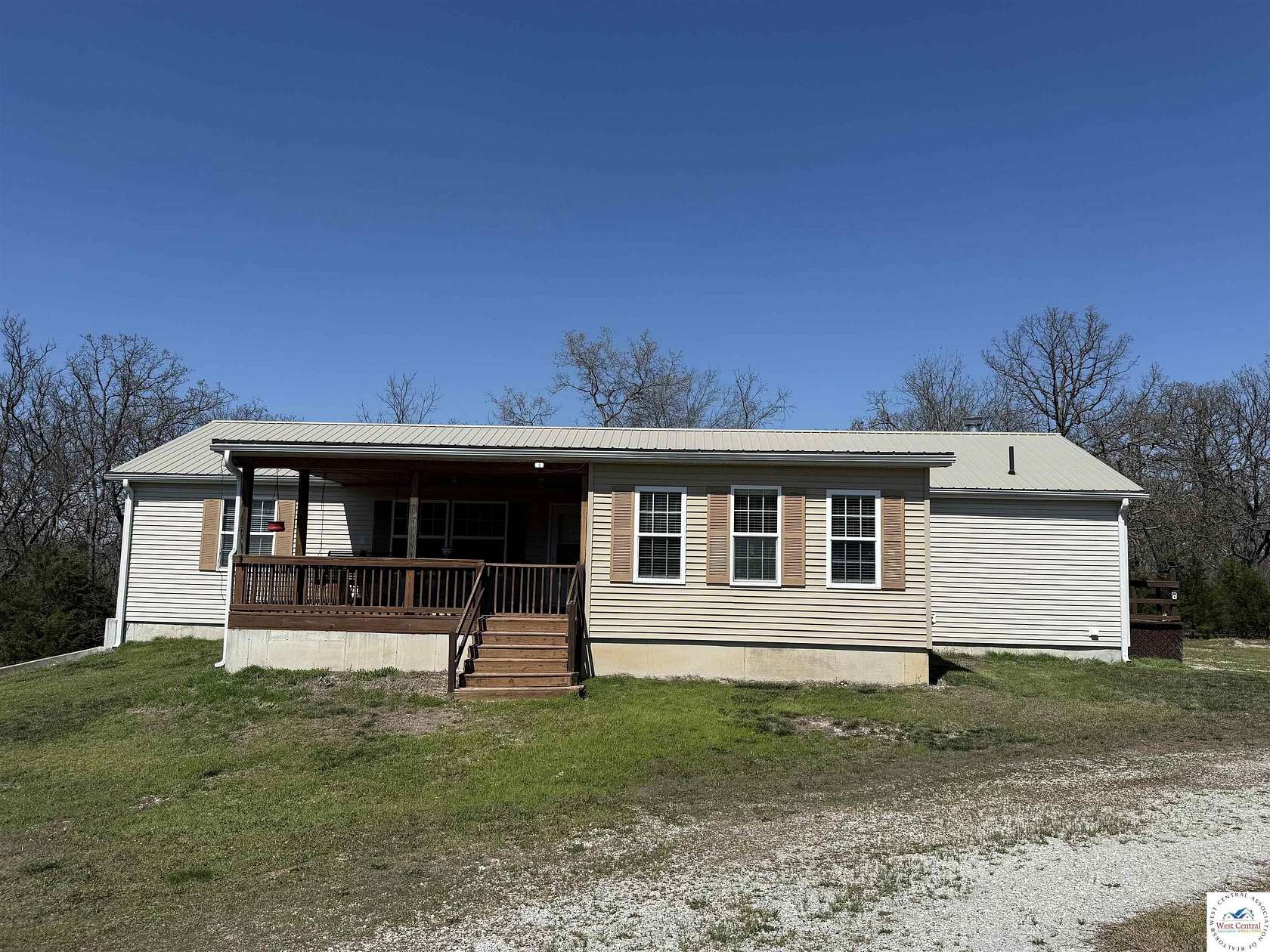 18 Acres of Recreational Land with Home for Sale in Warsaw, Missouri