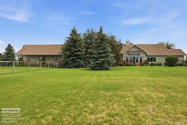 5 Acres of Land with Home for Sale in Cody, Wyoming