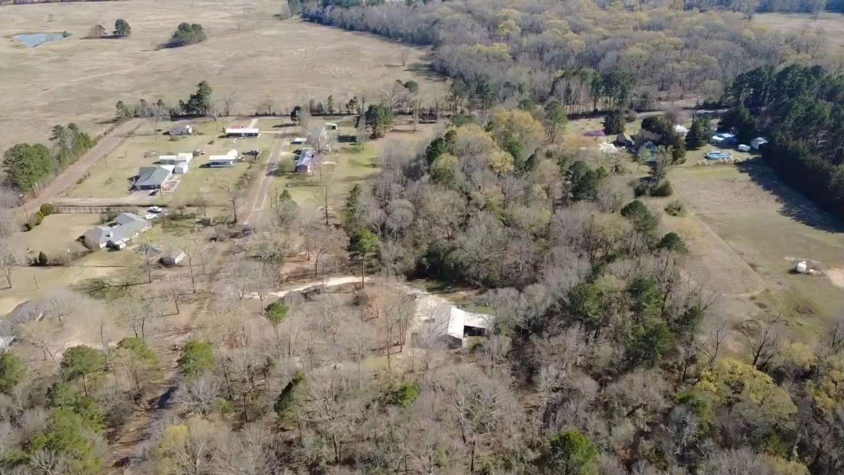 10.1 Acres of Land with Home for Sale in Ore City, Texas