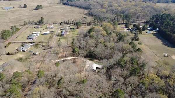 10.1 Acres of Land with Home for Sale in Ore City, Texas