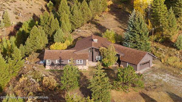 6.8 Acres of Land with Home for Sale in Jackson, Wyoming