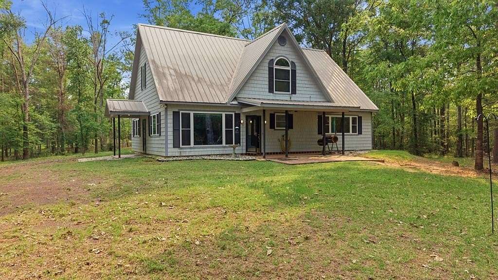 4.2 Acres of Land with Home for Sale in Hemphill, Texas