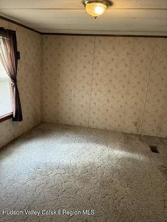 2.75 Acres of Land with Home for Sale in Woodridge, New York