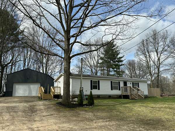 1.76 Acres of Land with Home for Sale in Grant, Michigan
