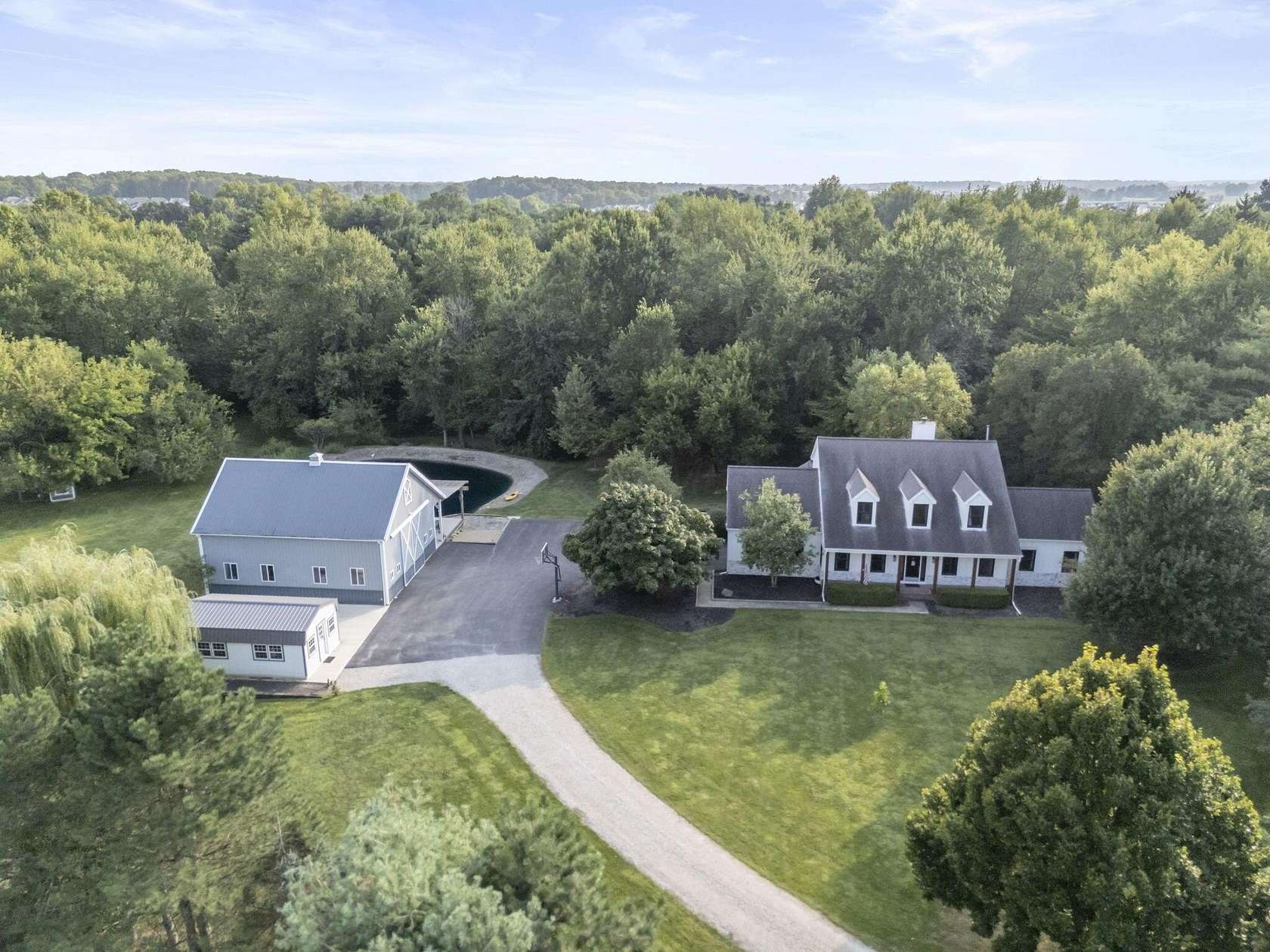 6.72 Acres of Land with Home for Sale in Plain City, Ohio