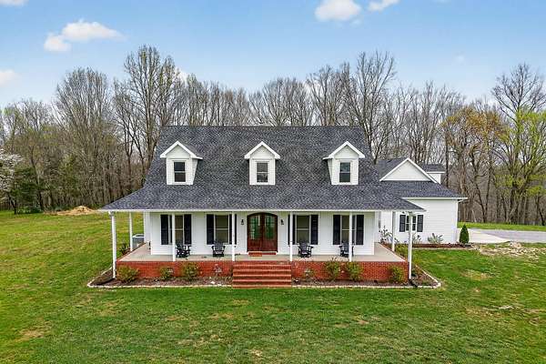 58 Acres of Recreational Land with Home for Auction in Smithville, Tennessee