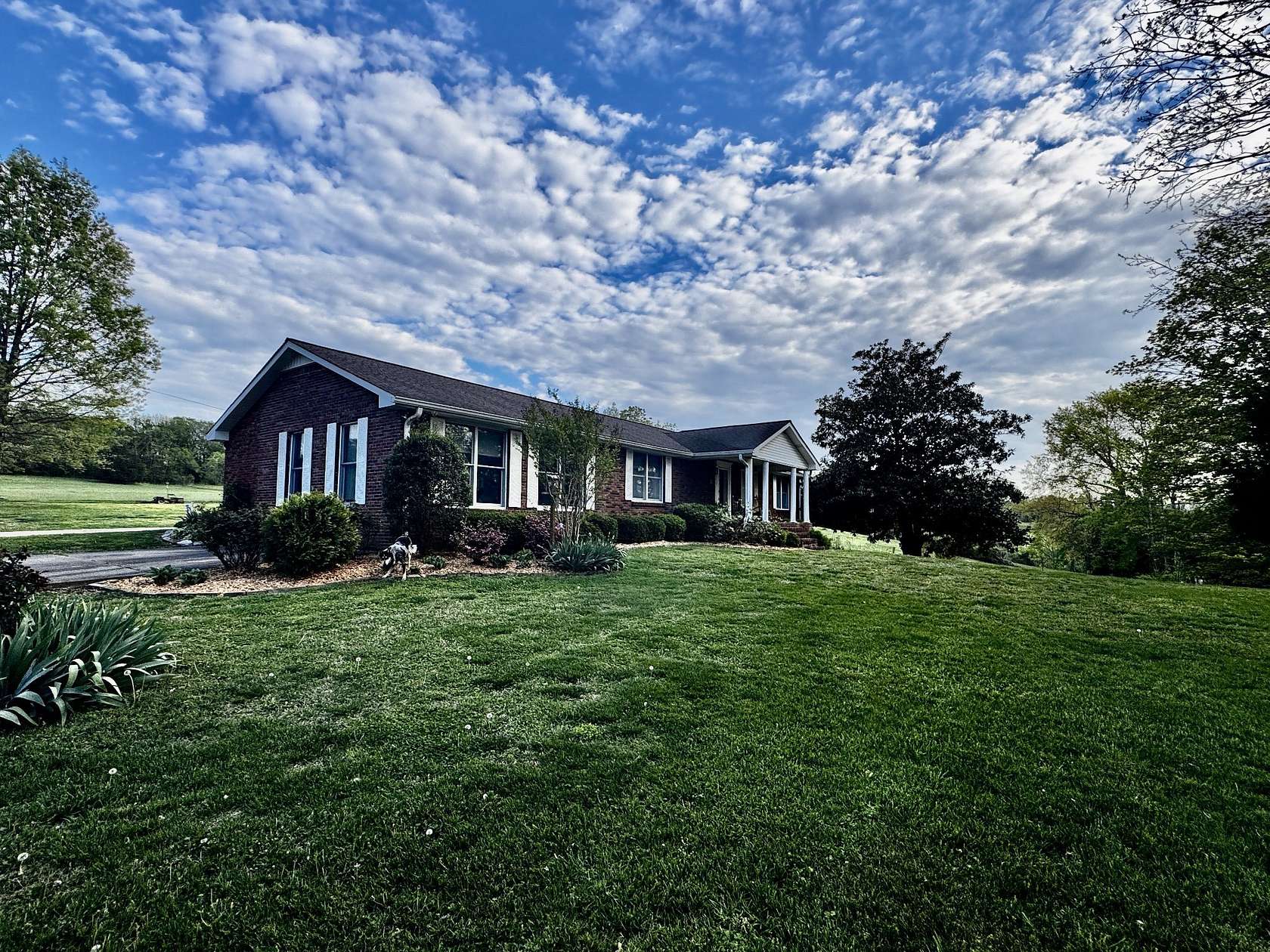 9.47 Acres of Land with Home for Sale in Brush Creek, Tennessee