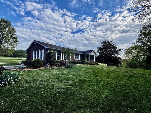 9.47 Acres of Land with Home for Sale in Brush Creek, Tennessee