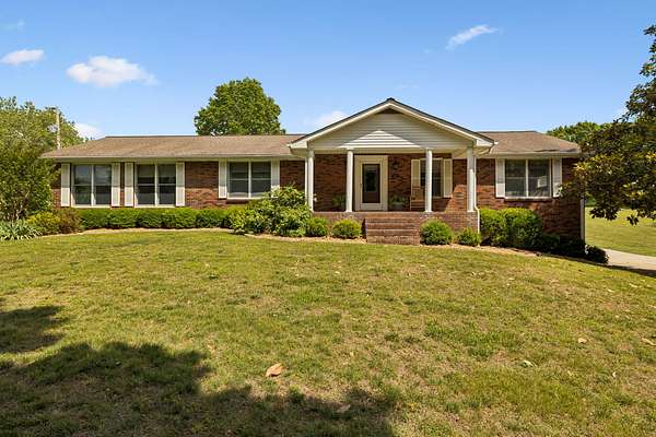 9.47 Acres of Land with Home for Sale in Brush Creek, Tennessee