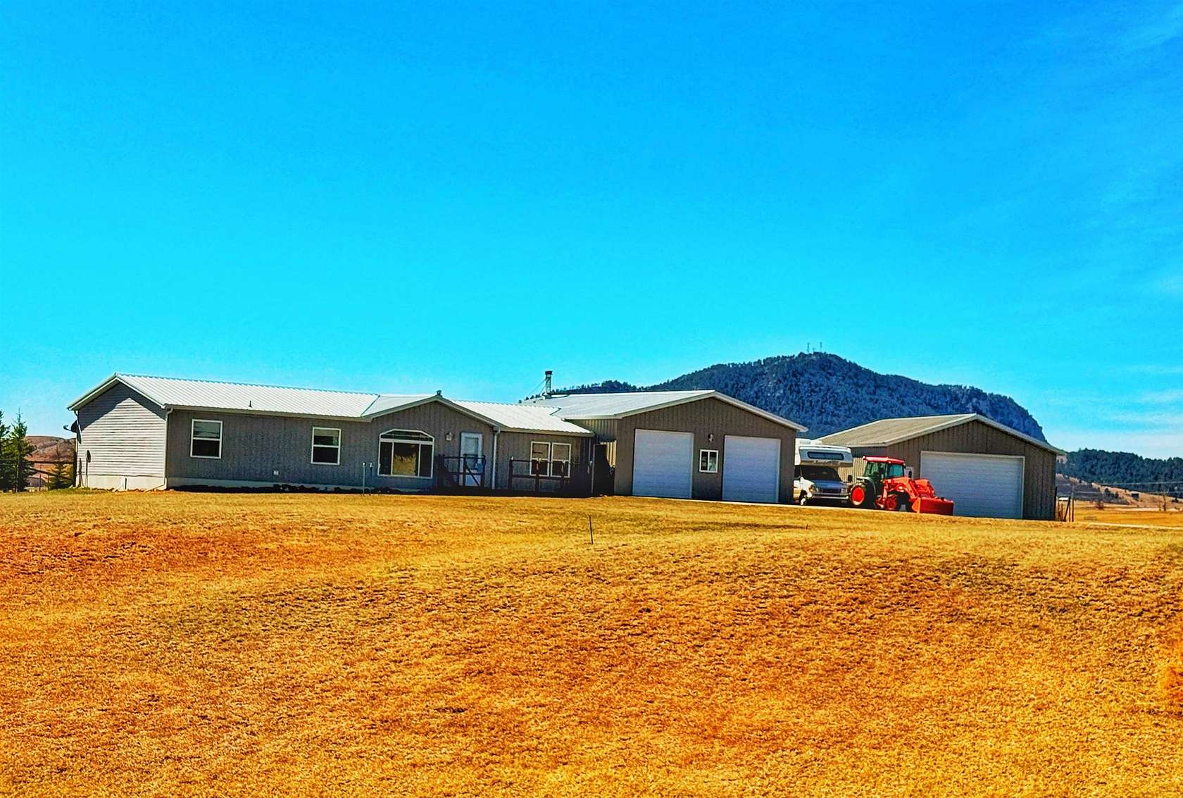 5 Acres of Land with Home for Sale in Sundance, Wyoming