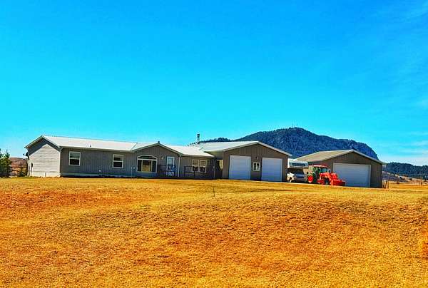 5 Acres of Land with Home for Sale in Sundance, Wyoming