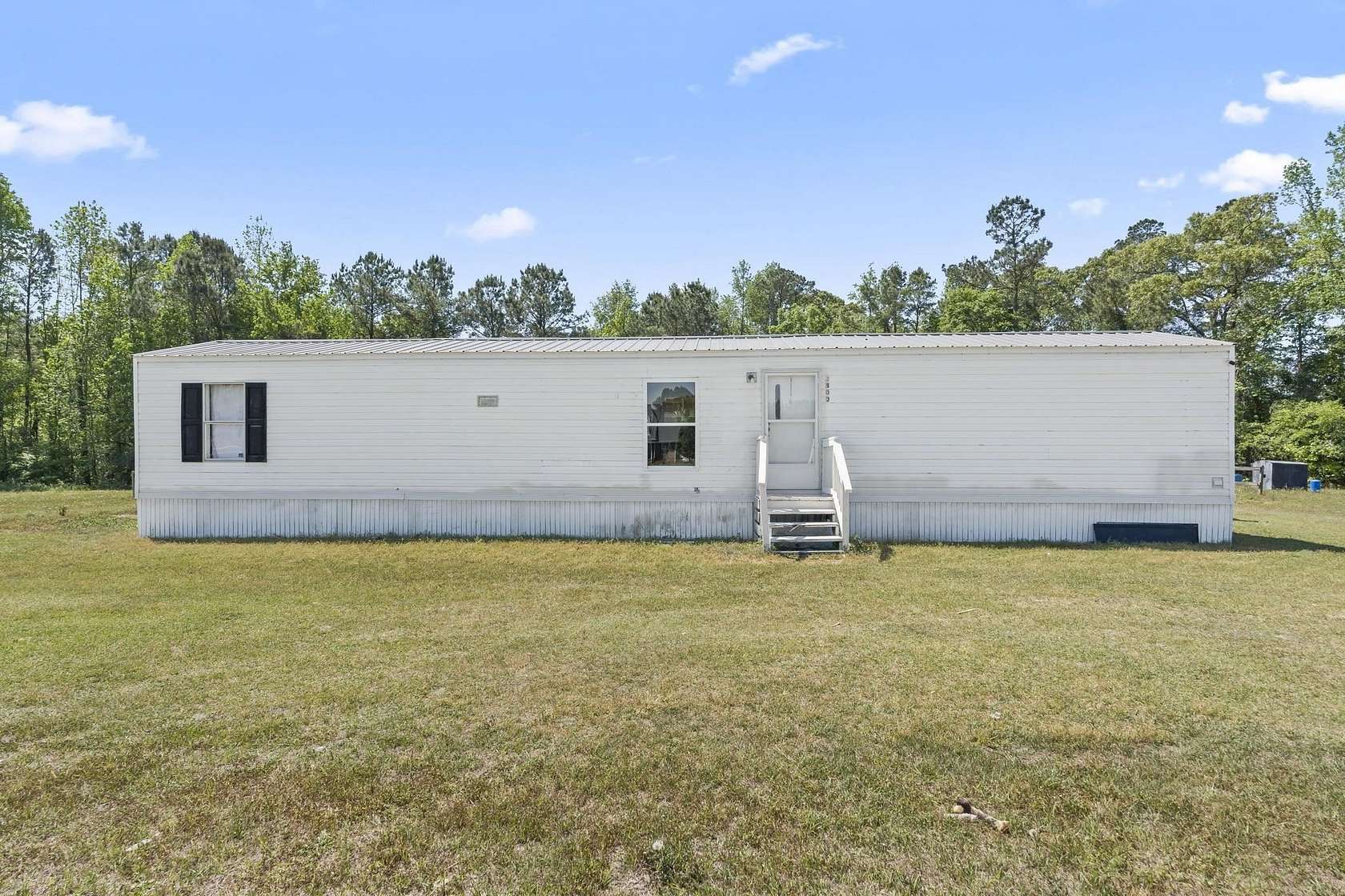 5.44 Acres of Land with Home for Sale in Galivants Ferry, South Carolina